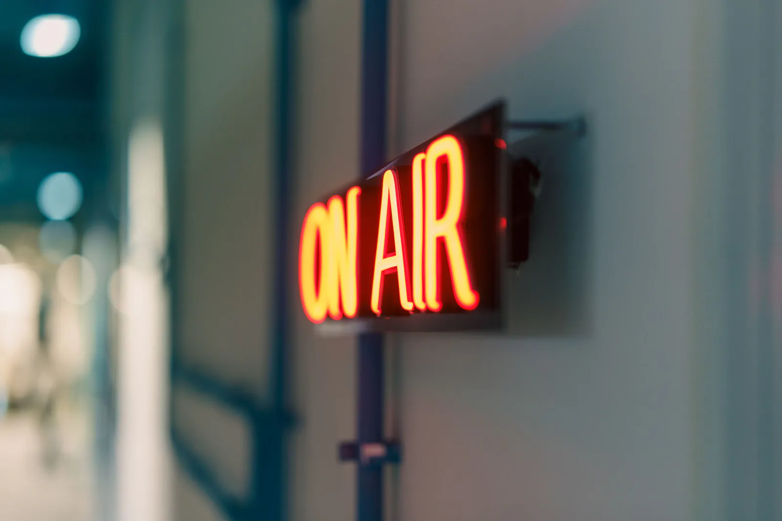 Glowing red on-air studio sign