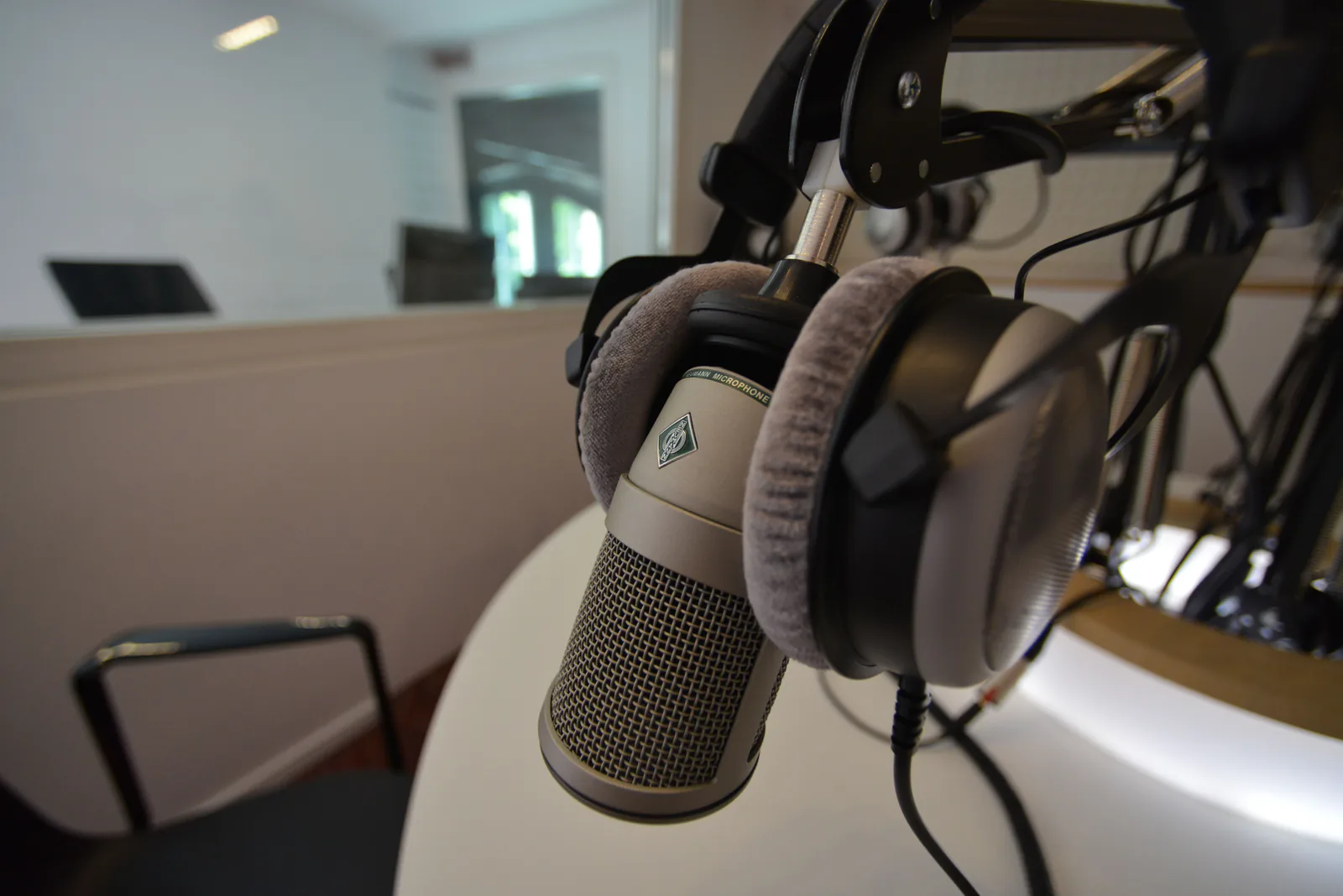 Studio microphone and headphones on the desk